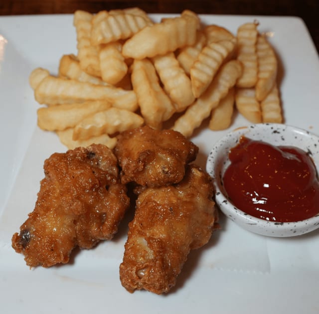 Chicken Wings with Fries.